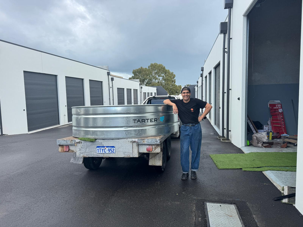 Terra Tanks galvanized stock tank pool loaded on a delivery trailer at the Perth warehouse
