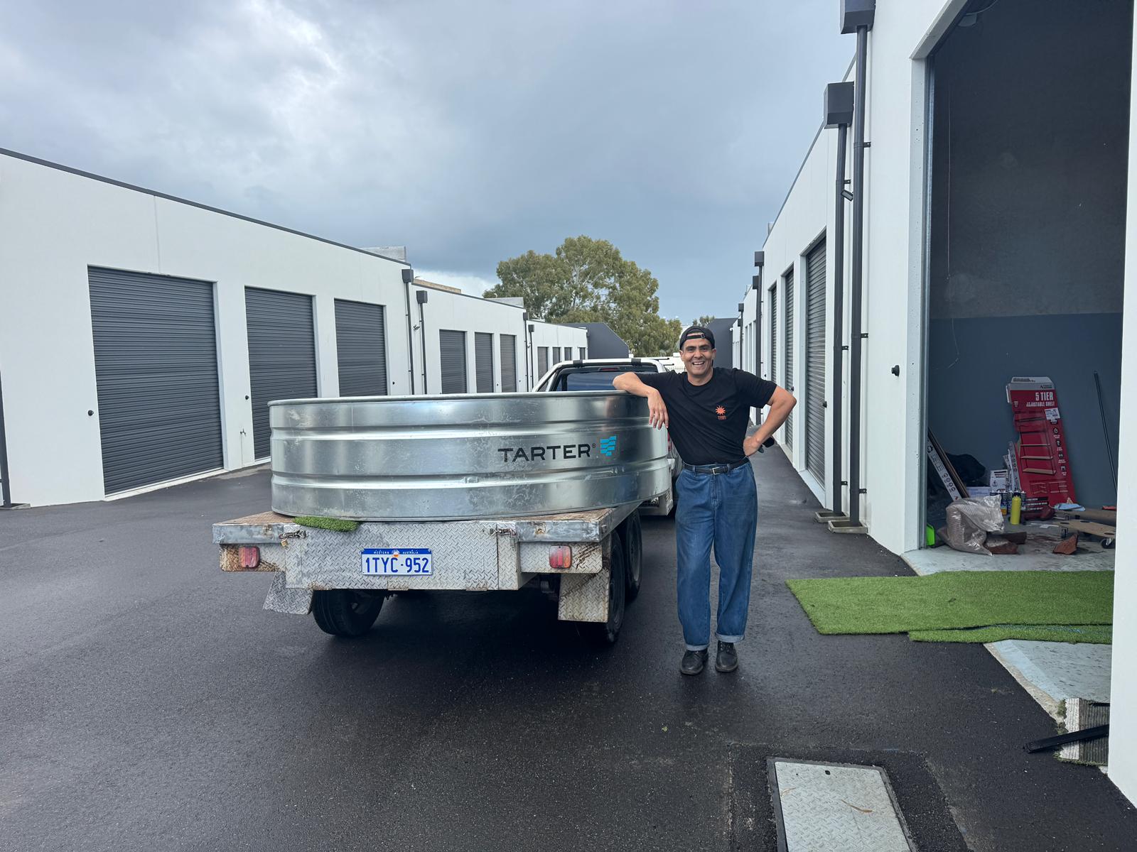 Terra Tanks galvanized stock tank pool loaded on a delivery trailer at the Perth warehouse