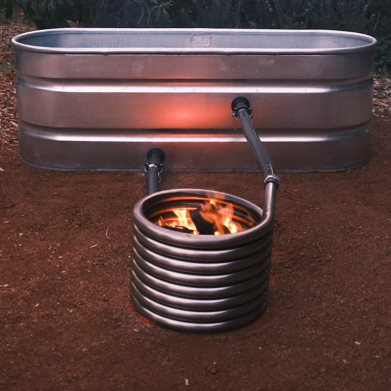 Off grid wood fired coil kit with fire installed