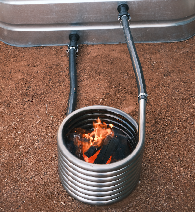 Off grid wood fired coil kit with fire close up