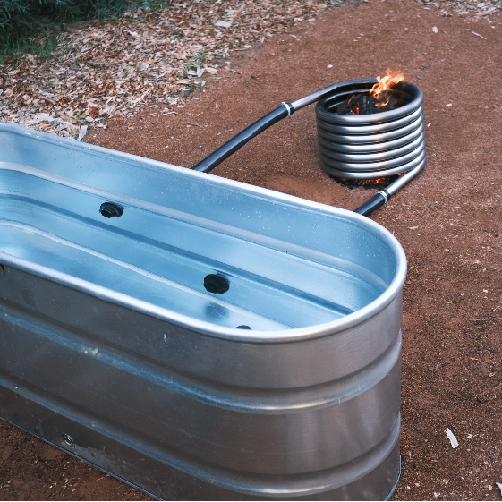 Off grid wood fired coil kit with fire with stock tank tub